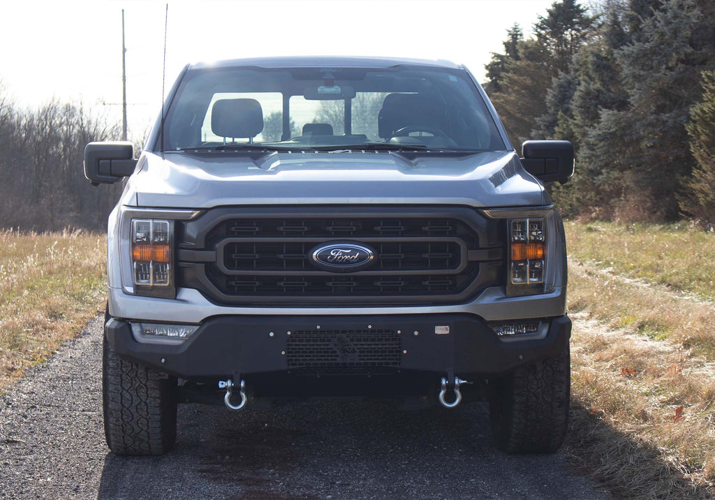 Fishbone Offroad Pelican Front Bumper with black texture powder coat and provisions for Factory OE park sensors on a 2021-Current Ford F-150.