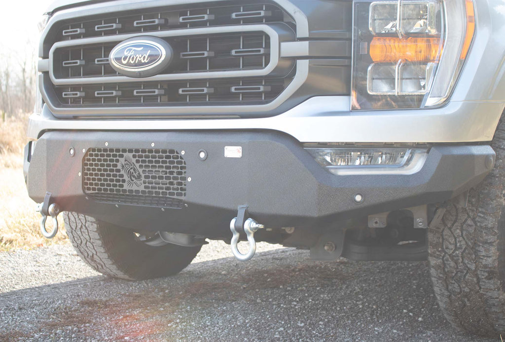 Fishbone Offroad Pelican Front Bumper with black texture powder coat and provisions for Factory OE park sensors on a 2021-Current Ford F-150.